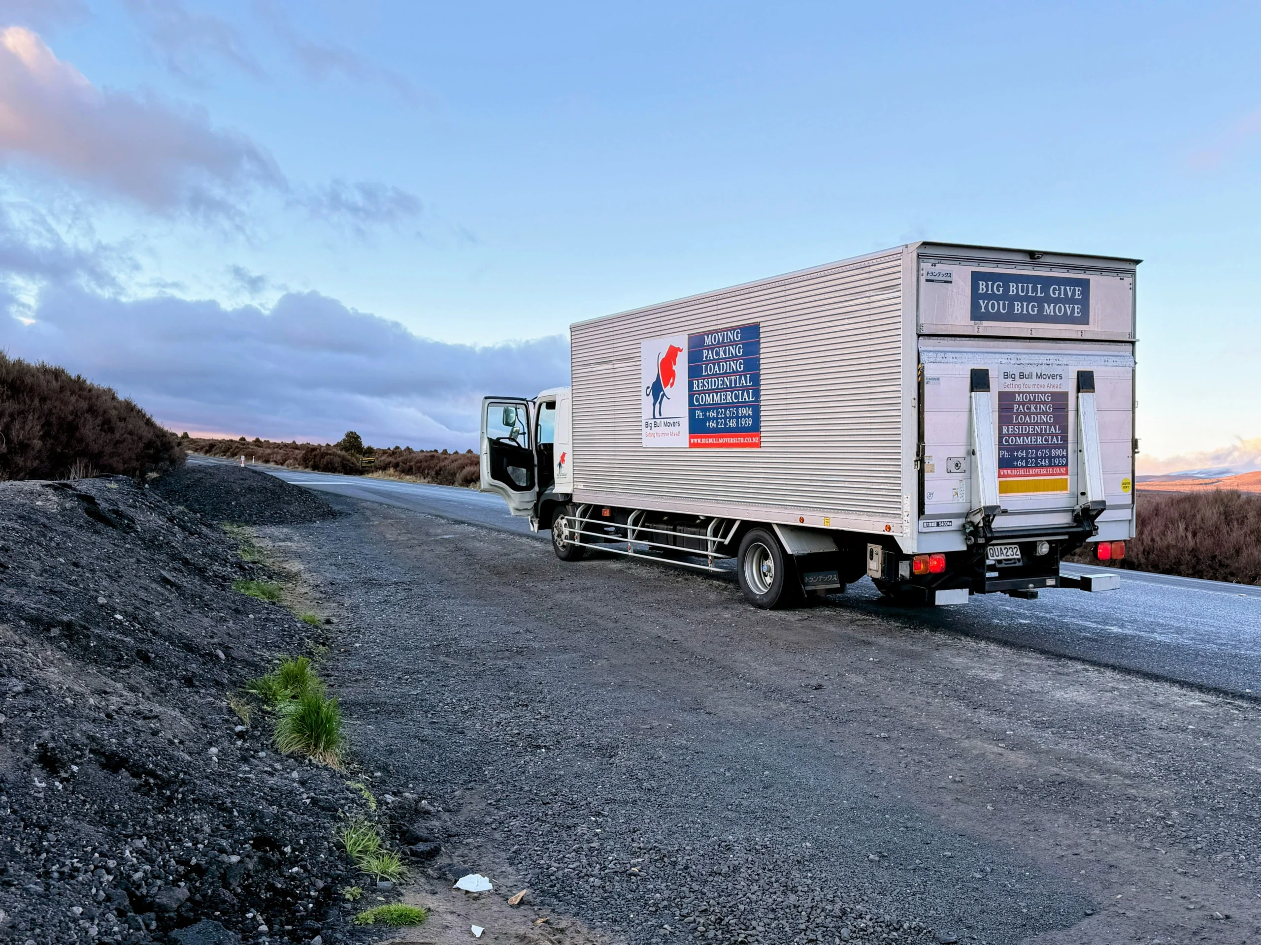 Big Bull Movers truck travelling on a highway for a long-distance move